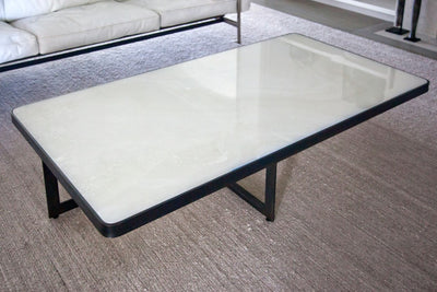 White Quartzite Coffee Table with Blackened Steel Cross Base